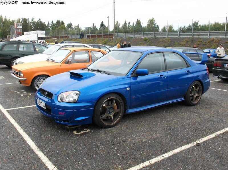 Sininen Subaru Impreza Sedan 2.0 WRX STi 2004