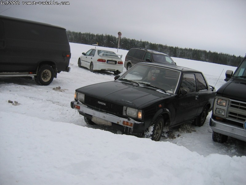 Musta Toyota Corolla DX